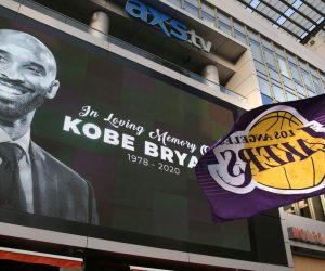 epa08168968 Fans of late Los Angeles Lakers guard Kobe Bryant gather at the LA Live entertainment complex across the street from the Staples Center, home of the Los Angeles Lakers, in Los Angeles, California, USA, 26 January 2020. According to media reports, former NBA basketball player Kobe Bryant died in a helicopter crash in Calabasas, California, USA on 26 January 2020. He was 41.  EPA/ADAM S DAVIS