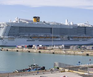 epaselect epa08178675 The cruise ship 'Costa Smeralda' is seen anchored in the port of Civitavecchia, northwest of Rome , Italy, 30 January 2020. Over 6,000 tourists were blocked in the cruise ship after the vast liner was placed on lockdown over two suspected cases of the deadly coronavirus. Samples from a Chinese couple were sent for testing after three doctors and a nurse boarded the Costa Crociere ship to tend to a woman running a fever, the local health authorities said. Costa Crociere confirmed that the ship, carrying some 7,000 people including the crew, was in lockdown.  EPA/MASSIMO PERCOSSI