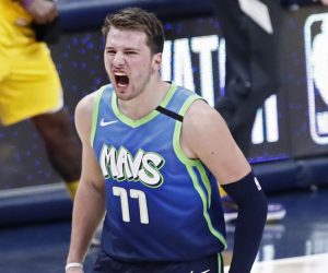 epa08118438 Dallas Mavericks forward Luka Doncic of Slovenia reacts after a basket against the Los Angeles Lakers in the second half of the NBA basketball game between the Los Angeles Lakers and the Dallas Mavericks at the American Airlines Center in Dallas, Texas, USA, 10 January 2020.  EPA/LARRY W. SMITH SHUTTERSTOCK OUT