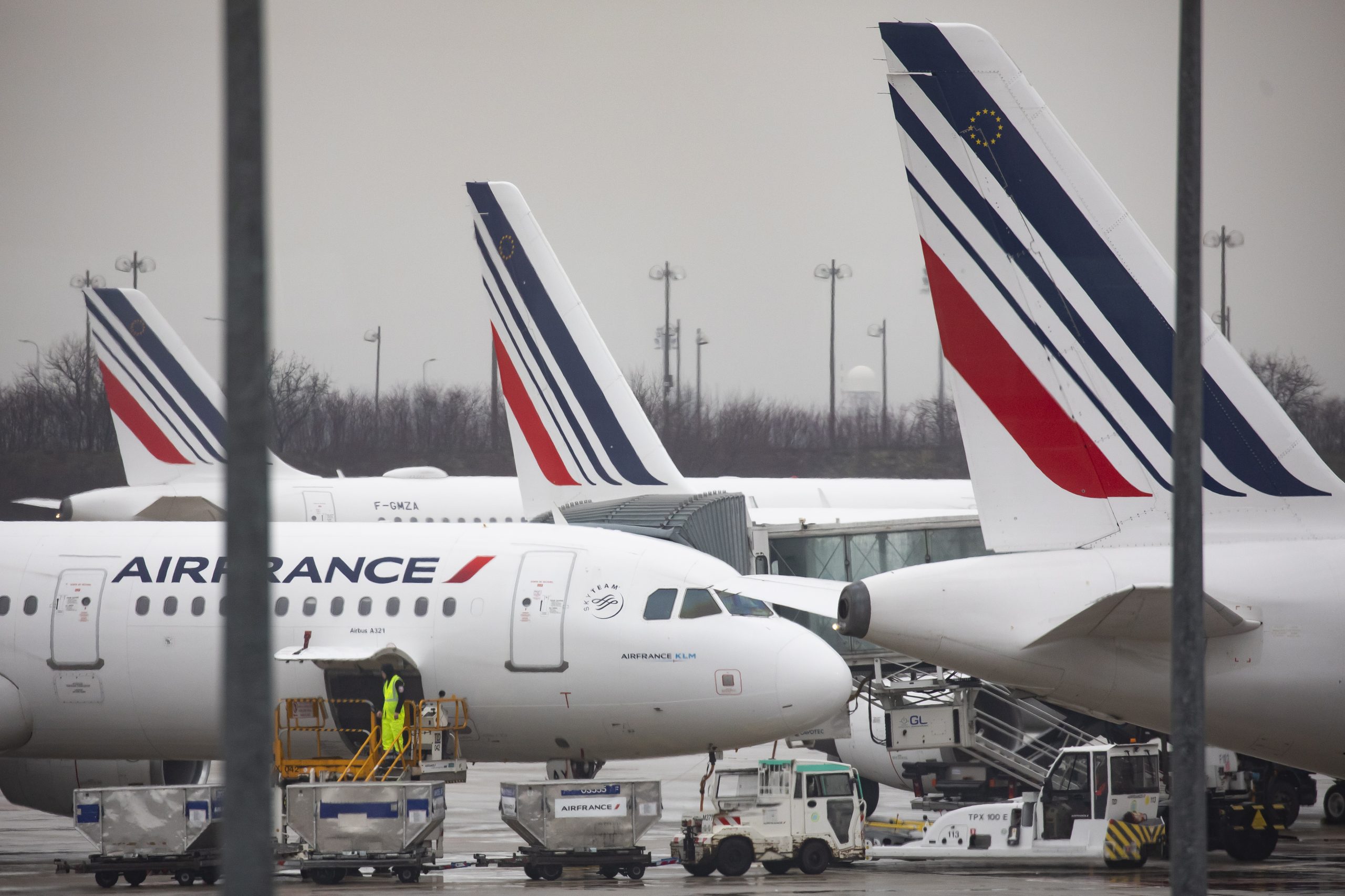 epa08179310 Air France airplanes seen at Roissy Charles de Gaulle airport, outside Paris, France, 30 January 2020. Air France cabin crew unions are calling to halt flights to China in a bid to reduce staff exposure to Coronavirus. Three cases of the Wuhan coronavirus have been identified in France, the Health Ministry announced on 24 January. The coronavirus, called 2019-nCoV, originating from Wuhan, China, has spread to all the 31 provinces of China as well as more than a dozen countries in the world. The outbreak of coronavirus has so far claimed 170 lives and infected more than 8,000 others, according to media reports.  EPA/IAN LANGSDON