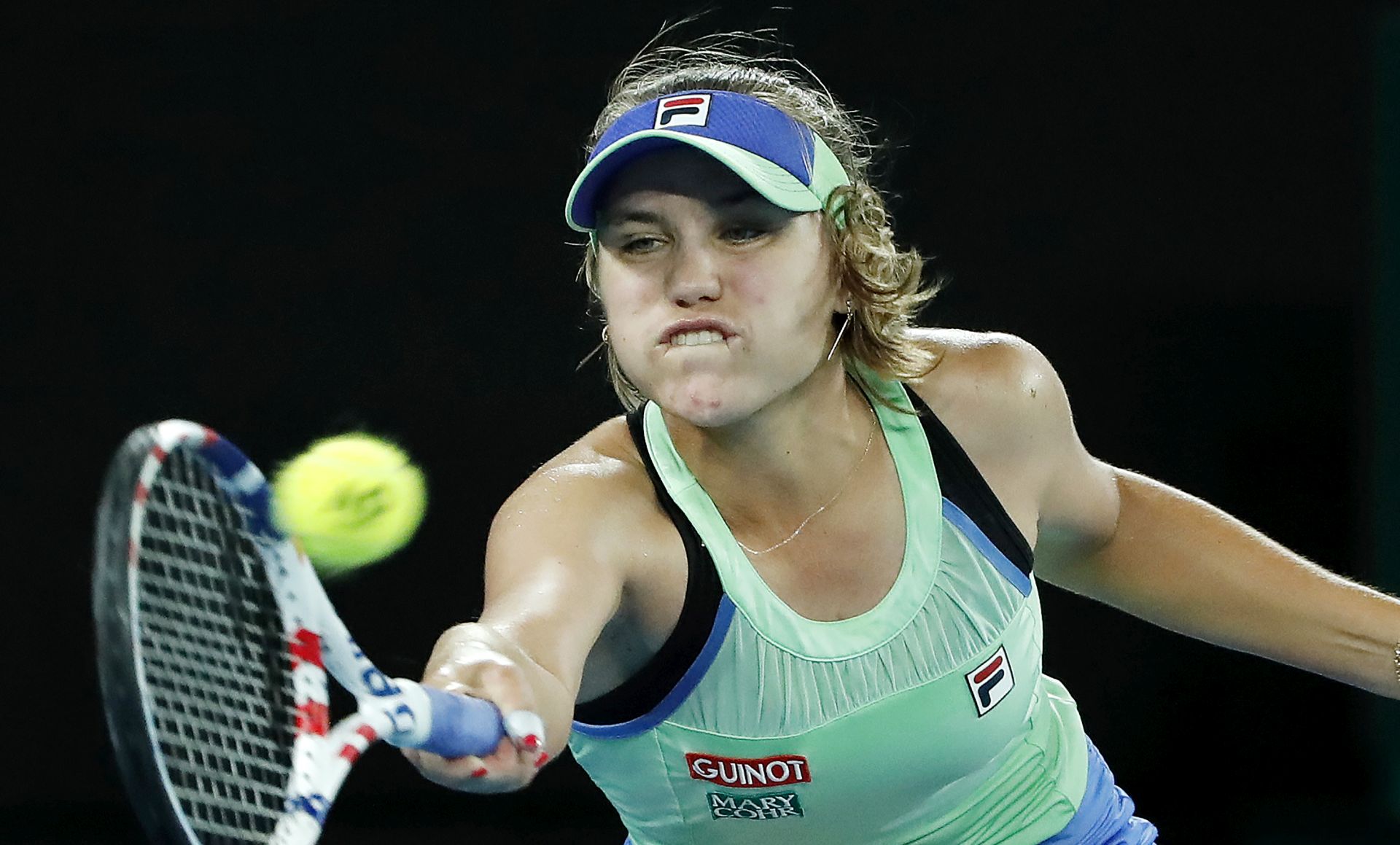 epa08184243 Sofia Kenin of USA in action during her women's singles final match against Garbine Muguruza of Spain at the Australian Open Grand Slam tennis tournament in Melbourne, Australia, 01 February 2020. EPA/FRANCIS MALASIG