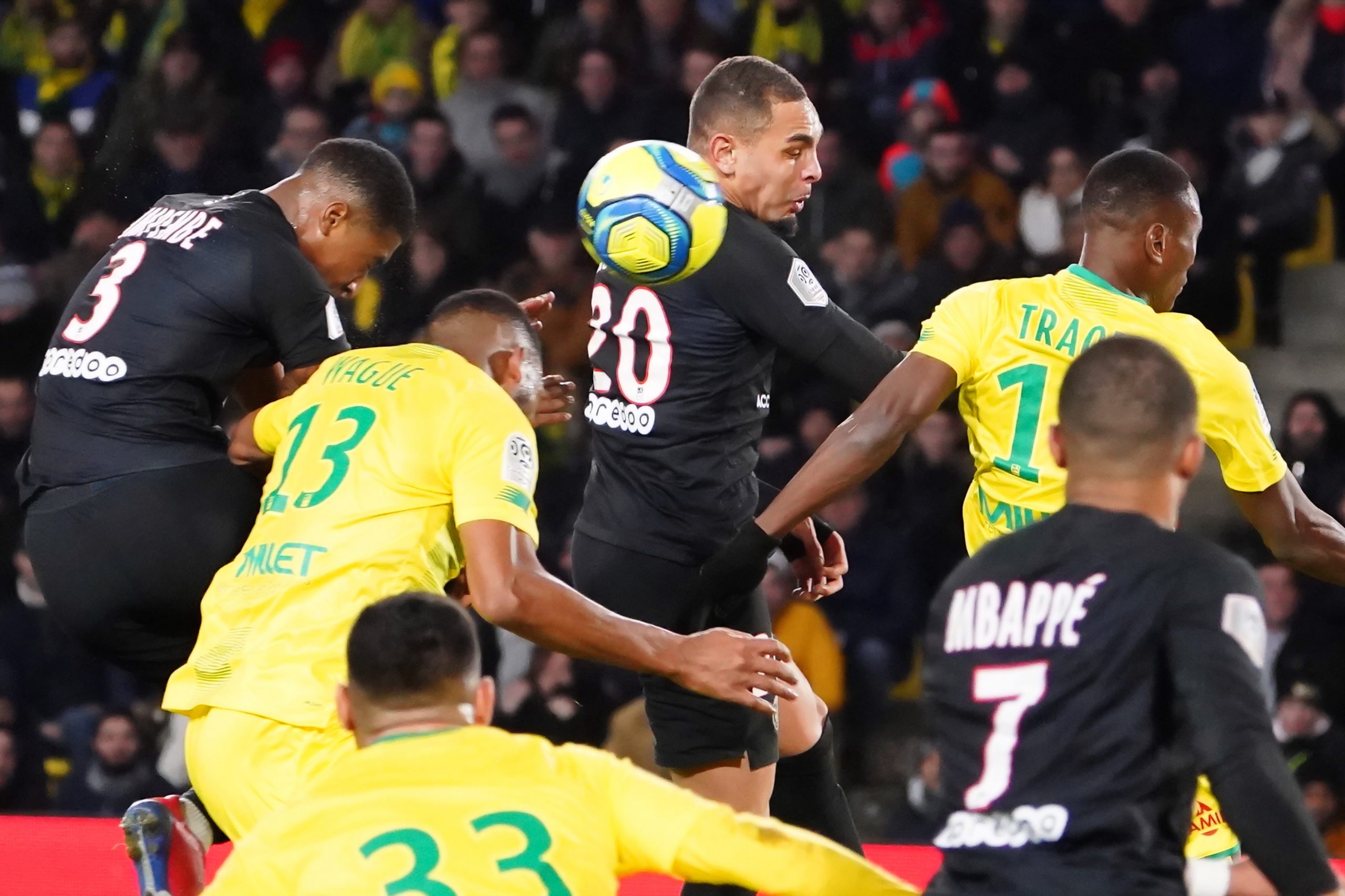 epa08193092 Layvin Kurzawa (C) of PSG in action during the French Ligue 1 soccer match between Nantes and Paris St Germain at Stadium of La Beaujoire in Nantes, France, 04 February 2020.  EPA/EDDY LEMAISTRE