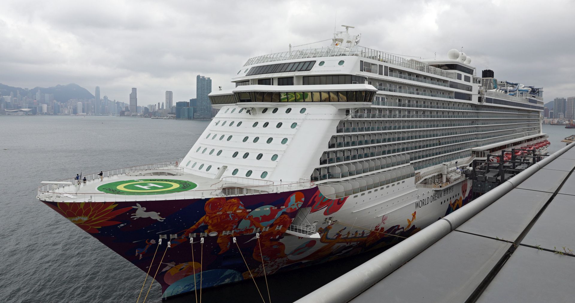 epa08205059 (FILE) - General view of the 151,000-tonne World Dream cruise liner, owned by Genting Hong Kong Limited, docked at the Kai Tak Cruise Terminal in Hong Kong, China, 05 February 2020 (reissued 09 February 2020). Hong Kong authorities on 09 February 2020 lifted quarantine for the new coronavirus on the cruise ship World Dream after passenger tests came back negative. The ship was denied port call in Taiwan and was forced to return to Hong Kong for an early arrival on 05 February.  EPA/JEROME FAVRE