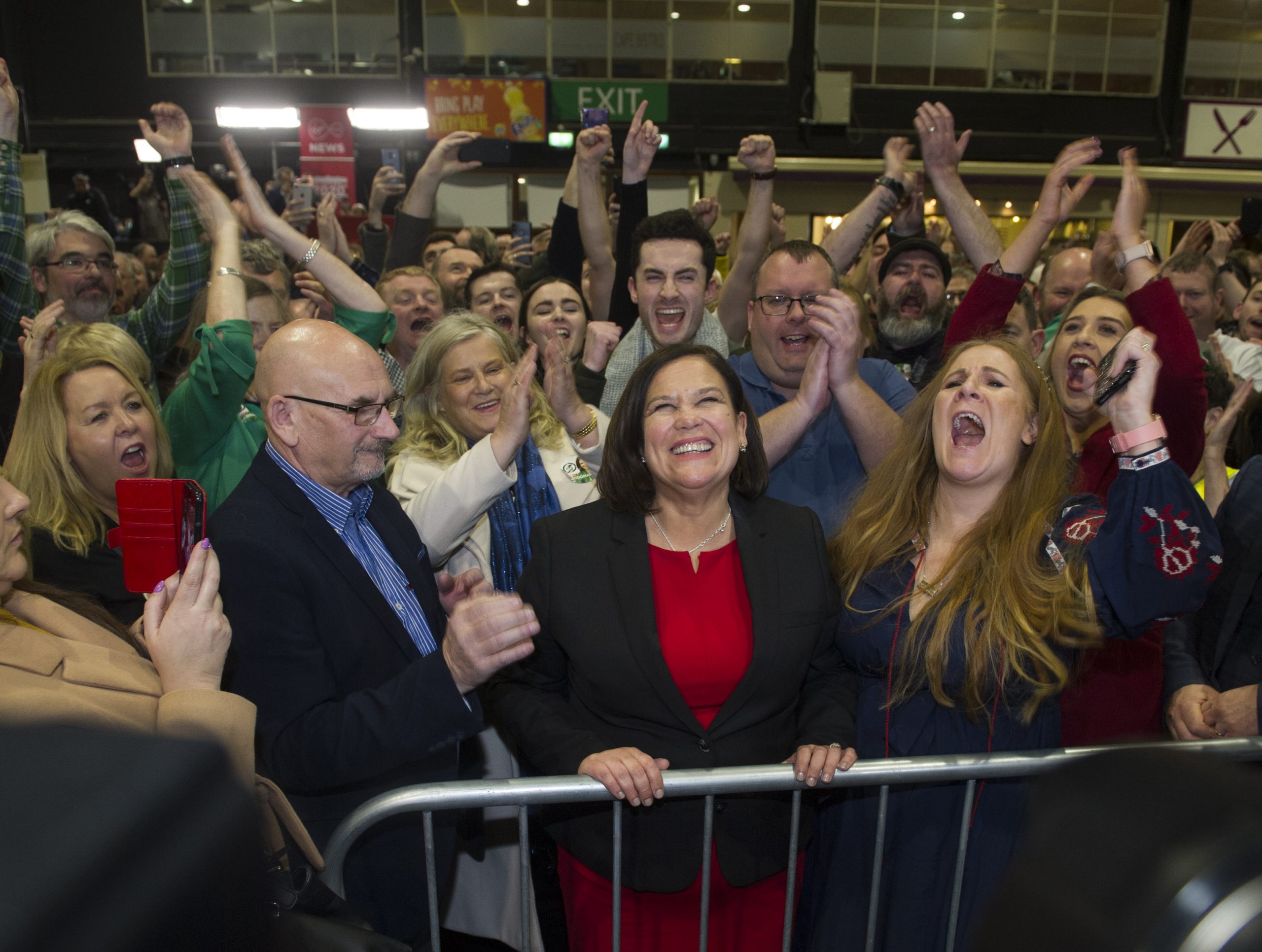 epa08206194 Sinn Fein president Mary Lou McDonald (C) reacts after being elected in her Dublin constituency at Dublin City count centre in Dublin, Ireland, 09 February 2020. Exit polls in the Irish general election suggest a three way tie between Fianna Fail, Fine Gael and Sinn Fein after the 08 February general elections.  EPA/AIDAN CRAWLEY