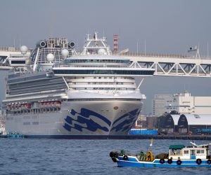 epa08218894 The Diamond Princess cruise ship sits at the Daikoku Pier Cruise Terminal in Yokohama, south of Tokyo, Japan, 14 February 2020 (issued 15 February 2020). According to media reports on 15 February, the US are planning to evacuate the remaining 380 American citizens aboard the Diamond Princess cruise ship quarantined in Yokohama.  EPA/FRANCK ROBICHON