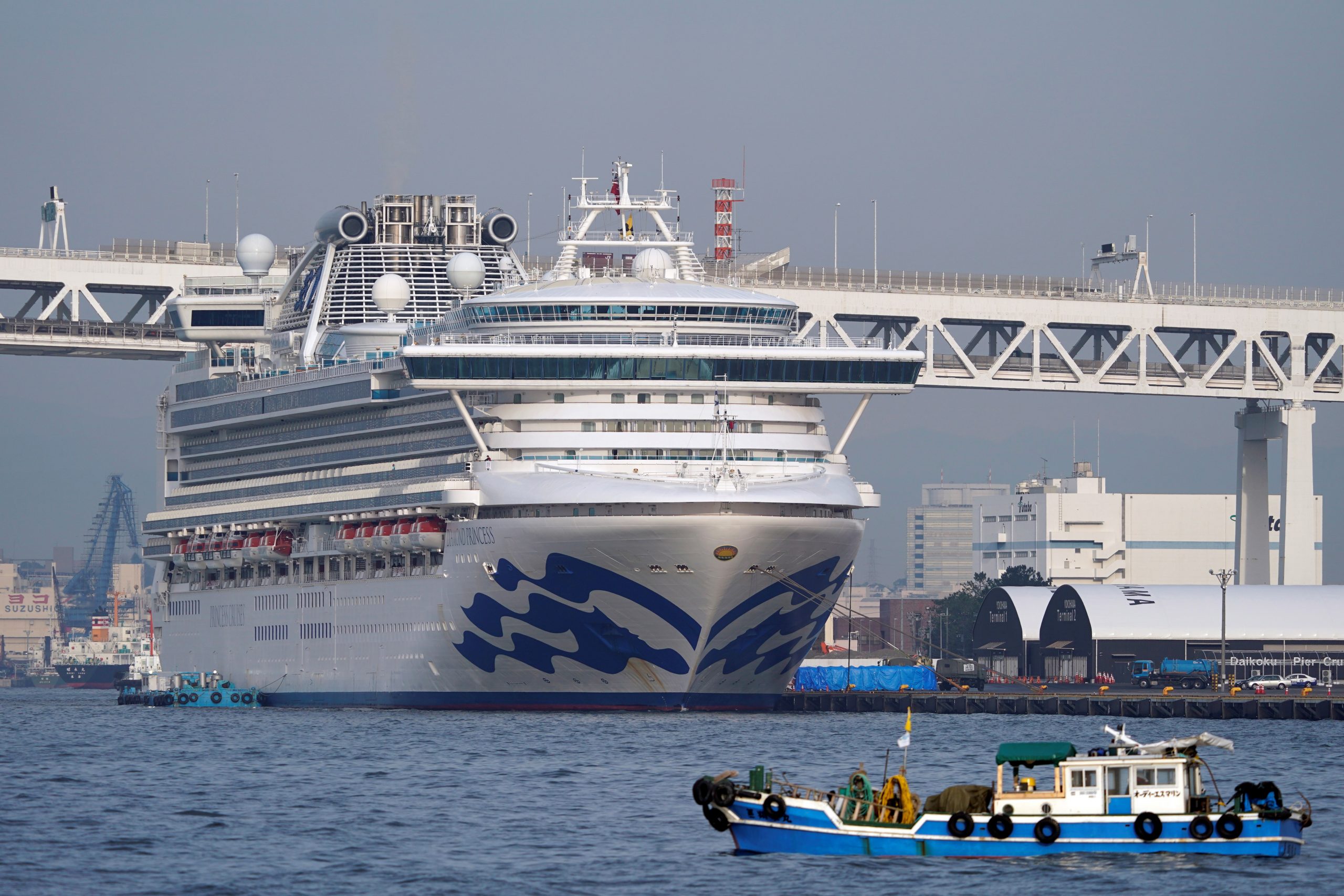 epa08218894 The Diamond Princess cruise ship sits at the Daikoku Pier Cruise Terminal in Yokohama, south of Tokyo, Japan, 14 February 2020 (issued 15 February 2020). According to media reports on 15 February, the US are planning to evacuate the remaining 380 American citizens aboard the Diamond Princess cruise ship quarantined in Yokohama.  EPA/FRANCK ROBICHON