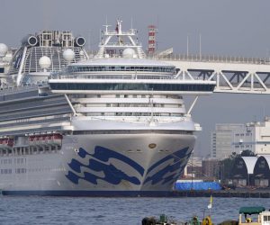 epa08218894 The Diamond Princess cruise ship sits at the Daikoku Pier Cruise Terminal in Yokohama, south of Tokyo, Japan, 14 February 2020 (issued 15 February 2020). According to media reports on 15 February, the US are planning to evacuate the remaining 380 American citizens aboard the Diamond Princess cruise ship quarantined in Yokohama.  EPA/FRANCK ROBICHON