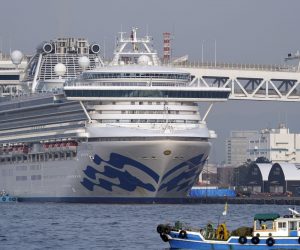epa08218894 The Diamond Princess cruise ship sits at the Daikoku Pier Cruise Terminal in Yokohama, south of Tokyo, Japan, 14 February 2020 (issued 15 February 2020). According to media reports on 15 February, the US are planning to evacuate the remaining 380 American citizens aboard the Diamond Princess cruise ship quarantined in Yokohama.  EPA/FRANCK ROBICHON