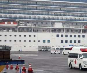 epa08220963 An ambulance believed to be carring an infected passenger of the Diamond Princess cruise ship leaves the Daikoku Pier Cruise Terminal in Yokohama, south of Tokyo, Japan, 16 February 2020. According to latest media reports, another 70 passengers of the Diamond Princess cruise ship have been tested positive for the Covid-19 coronavirus. A total number of 355 people from the ship have been infected by the new coronavirus.  EPA/FRANCK ROBICHON