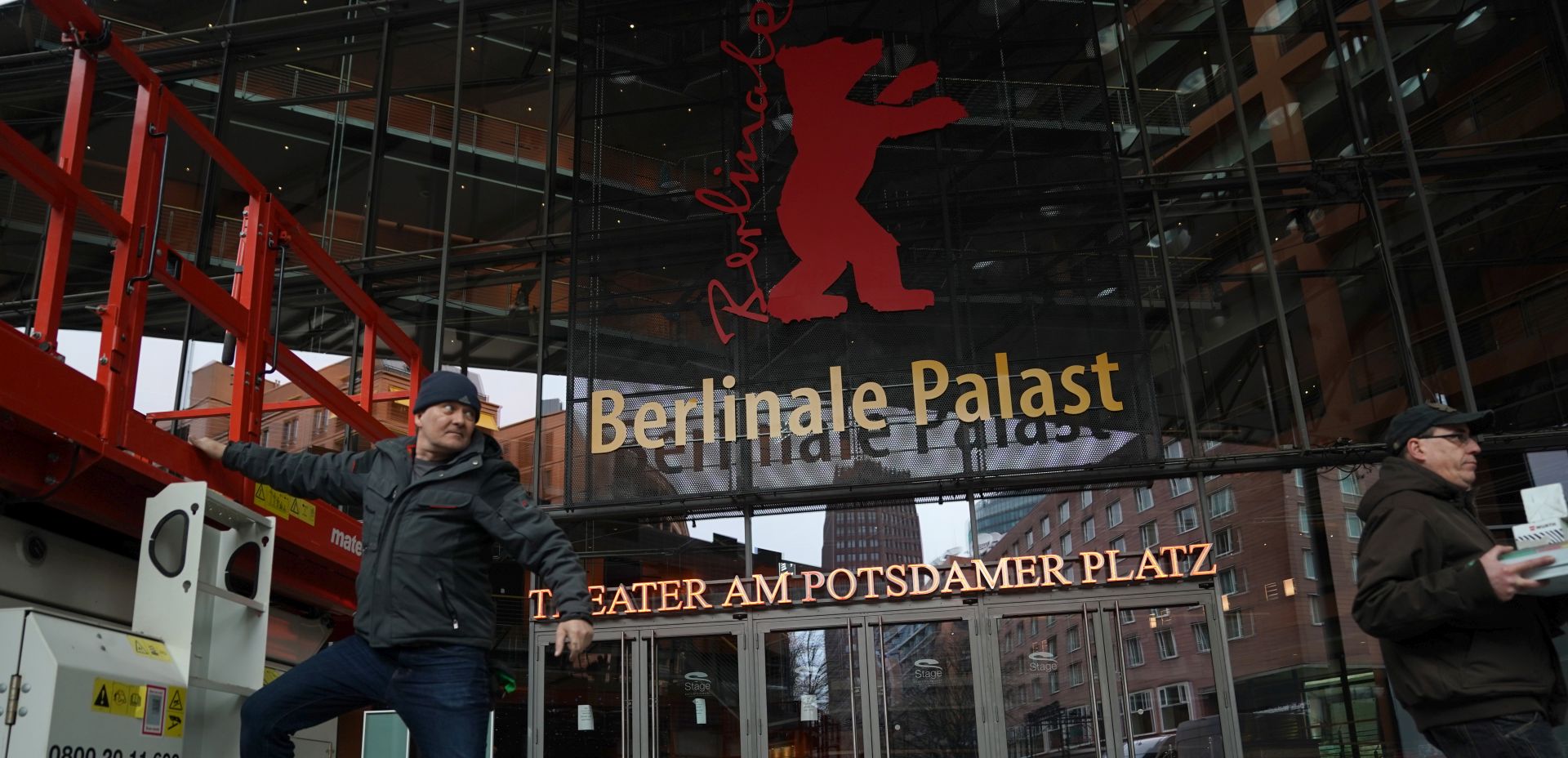 epa08221684 Construction workers in action at the Berlinale Palace ahead of the 70th annual Berlin International Film Festival (Berlinale), in Berlin, Germany, 16 February 2020. The Berlinale runs from 20 February to 01 March 2020.  EPA/ALEXANDER BECHER