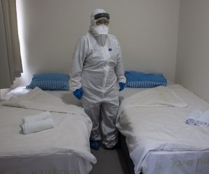 epa08227716 Israeli Professor Galia Rahavm the head of infectious diseases stands at one of the rooms where returning Israelis will stay under observation and isolation at the Chaim Sheba Medical Center at Tel Hashomer in Ramat Gan, Israel, 19 February 2020, for discussion on the Coronavirus. Doctors will monitor patients that have been in contact with the virus from the tent.  EPA/HEIDI LEVINE / POOL