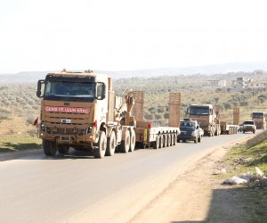 epa08230686 Turkish military vehicles drive east of Idlib, Syria, 20 February 2020.  EPA/YAHYA NEMAH