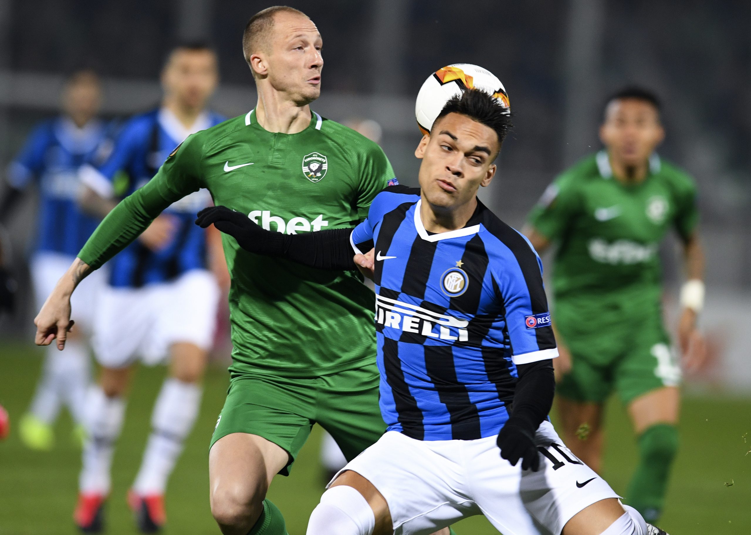 epa08231778 Inter's Lautaro Martinez (R) in action against Anton Nedyalkov (L) of Ludogorets during the UEFA Europa League round of 32, first leg soccer match between PFC Ludogorets Razgrad and Inter Milan in Razgrad, Bulgaria, 20 February 2020.  EPA/VASSIL DONEV