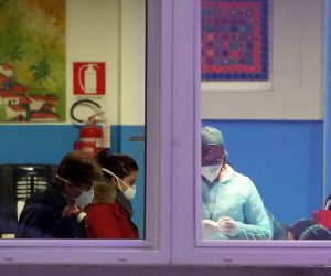 epa08241901 Medical personnel perform medical tests in Vo' Euganeo, Padova, Italy, 23 February 2020. Two deaths from the novel coronavirus sparked fears throughout northern Italy as about 50,000 people were poised for a weeks-long lockdown imposed by authorities trying to halt a further increase in infections. Italy on 21 February became the first country in Europe to report the death of one of its own nationals from the virus, triggering travel restrictions on about a dozen towns where the number of people contaminated has continued to rise.  EPA/NICOLA FOSSELLA