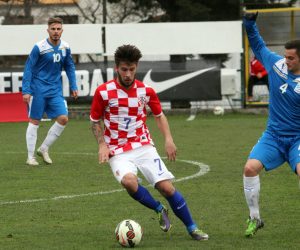 24.02.2015., stadion NK Primorac - Zuknica, Rijeka - Medjunarodna prijateljska nogometna utakmica U-21, Hrvatska - Italija Serie B.  Mihovil Jeronim Klapan , Andrea Schiavone. 
Photo: Goran Kovacic/PIXSELL