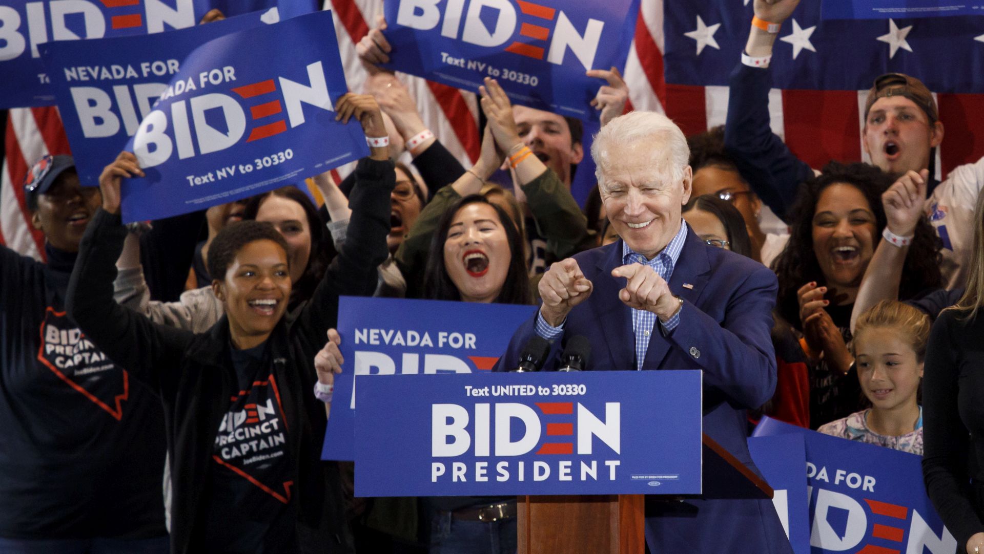 epaselect epa08239382 US Democratic presidential candidate, former Vice President Joe Biden (C, front), reacts as he addresses supporters during his Nevada post-caucus rally in Las Vegas, Nevada, USA, 22 February 2020. Biden was expected to finish in second place behind Bernie Sanders according to numerous projections. Vermont senator Bernie Sanders won the Nevada Democratic caucuses.  EPA/EUGENE GARCIA