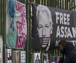 epa08246210 Supporters of Wikileaks founder Julian Assange protest outside Woolwich Crown Court in London, Britain, 25 February 2020. Assange is facing extradition to the US on 18 charges and faces up to 175 years in prison if found guilty.  EPA/WILL OLIVER