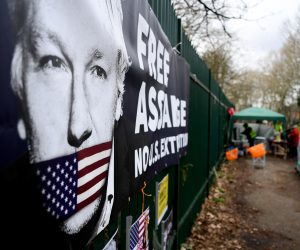 epa08249799 Julian Assange supporters outside Woolwich Crown Court in London, Britain, 26 February 2020.  Assange is facing extradition to the US on 18 charges and faces up to 175 years in prison if found guilty.  EPA/ANDY RAIN