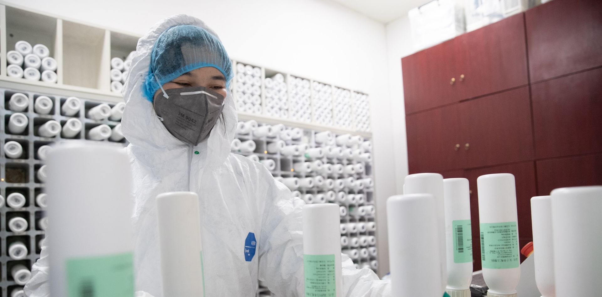 epa08264657 A staff member operates an intelligent dispensing machine for the production of traditional Chinese medicine (TCM) for coronavirus and COVID-19 patients in Tongji Hospital in Wuhan, China, 02 March 2020. The hospital has been using a mixture of TCM and western drugs to treat people infected with the coronavirus. Although there is no specific treatment for the COVID-19 disease, more than 80 percent of China's coronavirus patients were prescribed the use of TCM alongside Western drugs with experts citing a higher recovery rate compared to just the use of mainstream treatments, according to local reports.  EPA/YFC CHINA OUT