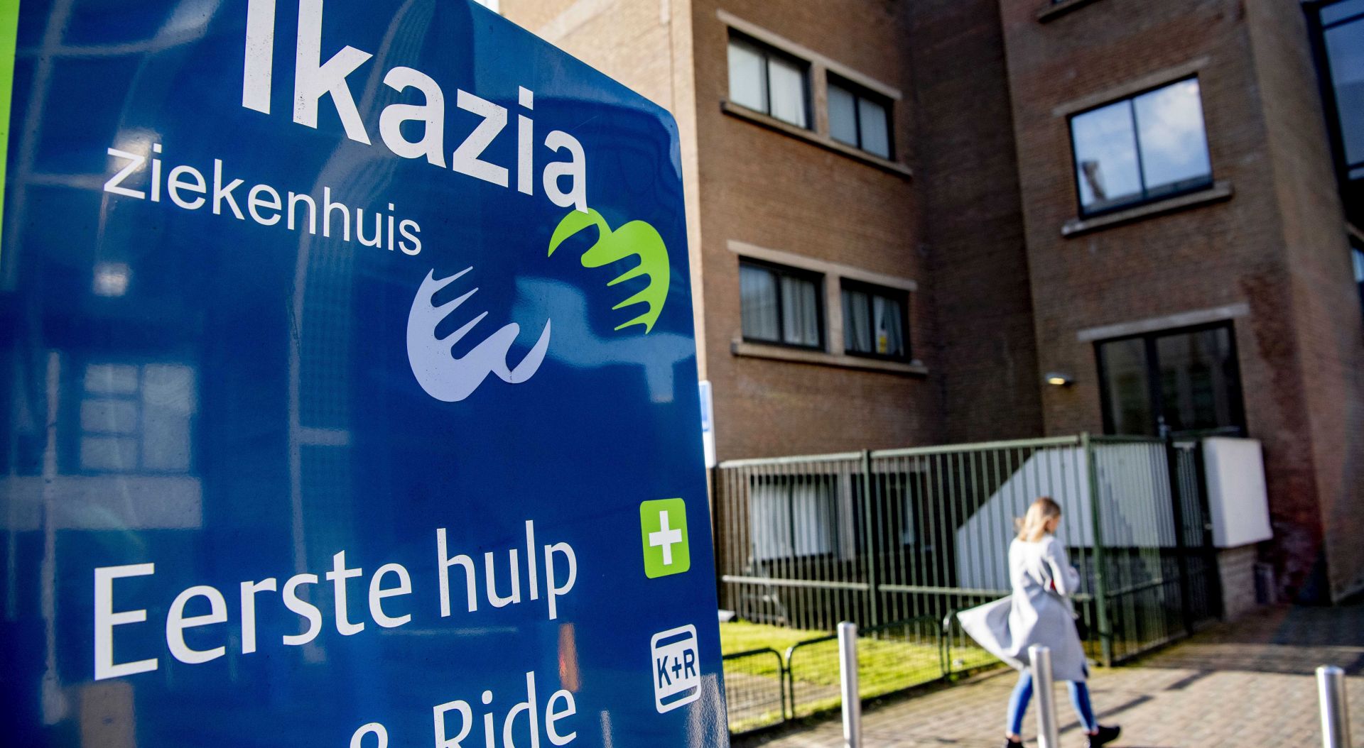 epa08274262 Exterior view of the Ikazia Hospital, where an 86-year-old man passed away after contracting the COVID-19 disease caused by the novel SARS-CoV-2 coronavirus in Rotterdam, The Netherlands, 06 March 2020.  EPA/ROBIN UTRECHT