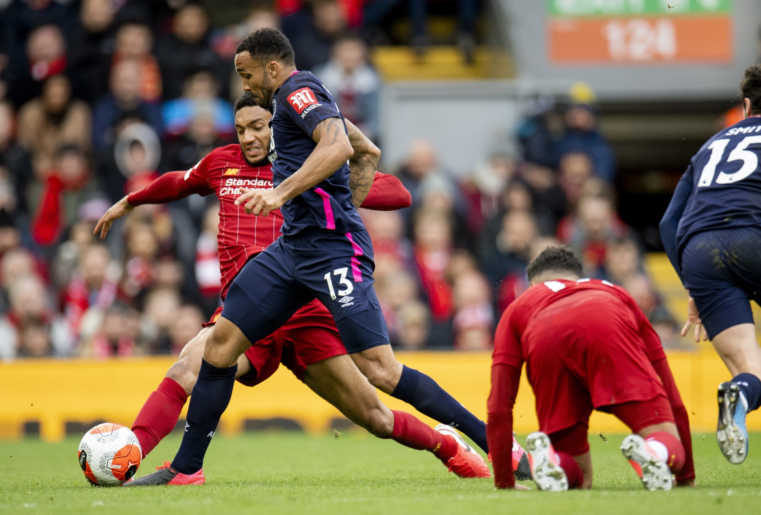 epa08276379 Liverpool's Joe Gomez (L) in action with Bournemouth's Callum Wilson (R) during the English Premier League soccer match between Liverpool and Bournemouth at Anfield, Liverpool, Britain, 07 March 2020.  EPA/PETER POWELL EDITORIAL USE ONLY. No use with unauthorized audio, video, data, fixture lists, club/league logos or 'live' services. Online in-match use limited to 120 images, no video emulation. No use in betting, games or single club/league/player publications