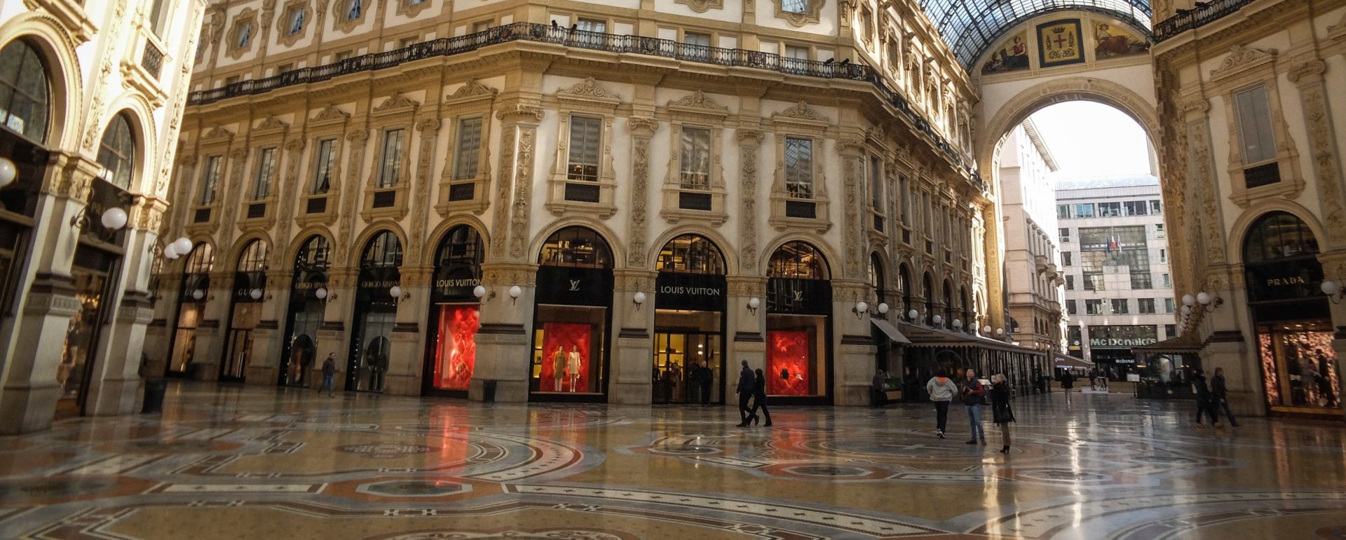 epa08278005 An interior view of the nearly-empty Galleria Vittorio Emanuele II arcades (Italy's oldest active shopping mall) in the Lombardian capital of Milan, northern Italy, 08 March 2020. The Italian authorities have taken the drastic measure of shutting off the entire northern Italian region of Lombardy – home to about 16 million people – in a bid to halt the ongoing coronavirus epidemic in the Mediterranean country. The number of confirmed cases of the COVID-19 disease caused by the SARS-CoV-2 coronavirus in Italy has jumped up to at least 5,883, while the death toll has surpassed 230, making Italy the nation with the third-highest number of infections (behind China and South Korea) and the second-highest death toll after China.  EPA/MATTEO CORNER