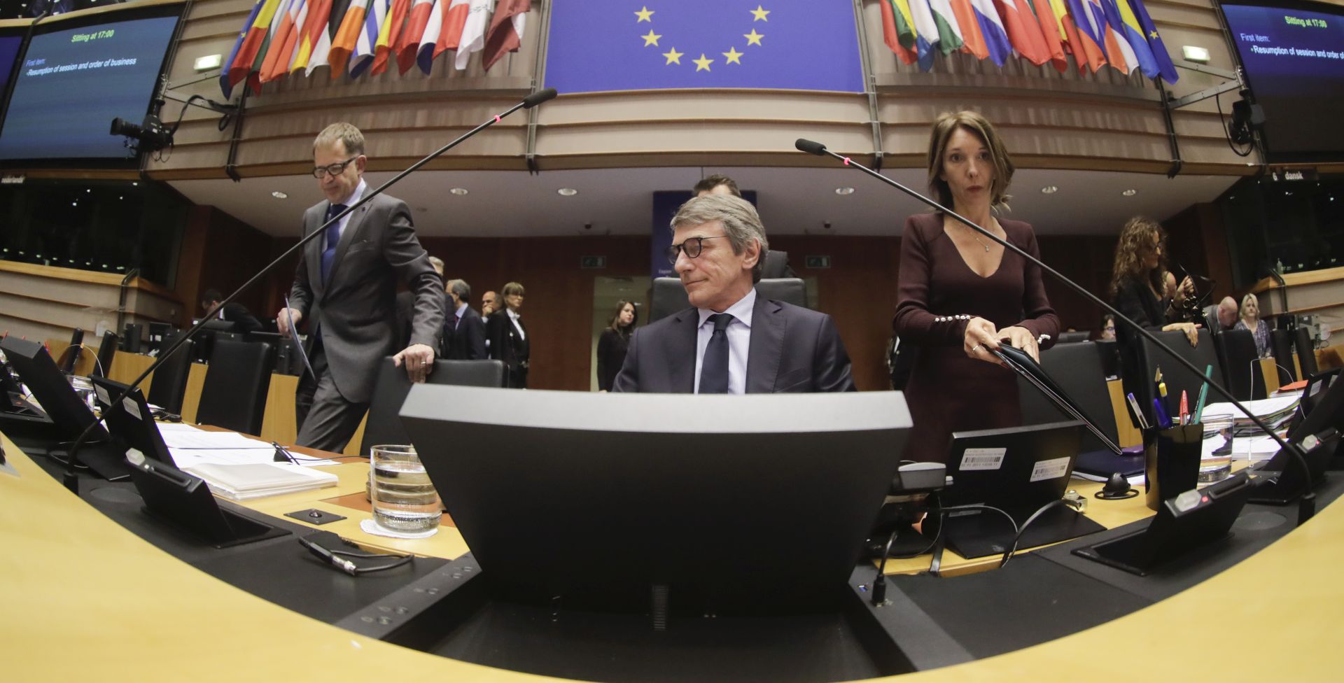 epa08281435 An image taken with a wide-angle lens shows European Parliament (EP) President David Sassoli announcing that the EP's plenary session, which was scheduled to last four days, has been reduced to only one day, in Brussels, Belgium, 09 March 2020. Due to the spread of the COVID-19 disease caused by the SARS-CoV-2 coronavirus,
the four-day plenary session that was supposed to take place at the EP's Strasbourg headquarters has been moved to Brussels, will be closed to the public and will last for only one day on 10 March.  EPA/OLIVIER HOSLET