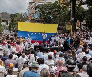 epa08284237 Venezuelan opposition leader Juan Guaido (C) speaks to hundreds of his supporters during a session of the National Assembly after a march called in the Las Mercedes sector, in Caracas, Venezuela, 10 March 2020. Protesters will march to the seat of Parliament while the ruling party, meanwhile, advances another parallel mobilization for peace.  EPA/Rayner Pena R.