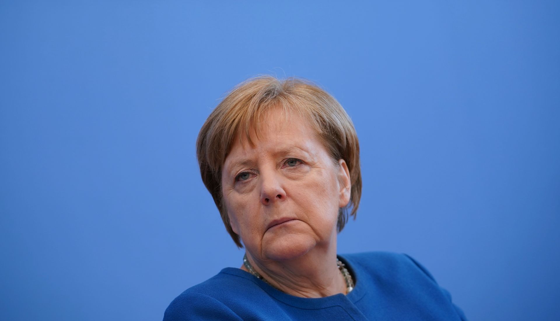epa08285643 German Chancellor Angela Merkel during a press conference at the Federal Press Conference (Bundespressekonferenz) in Berlin, Germany, 11 March 2020. After a video conference with the European Council, German Chancellor Angela Merkel, German Health Minister Jens Spahn and Head of the Robert Koch Institute Lothar Wieler gave a joint press conference to answer questions on the coronavirus crisis.  EPA/CLEMENS BILAN