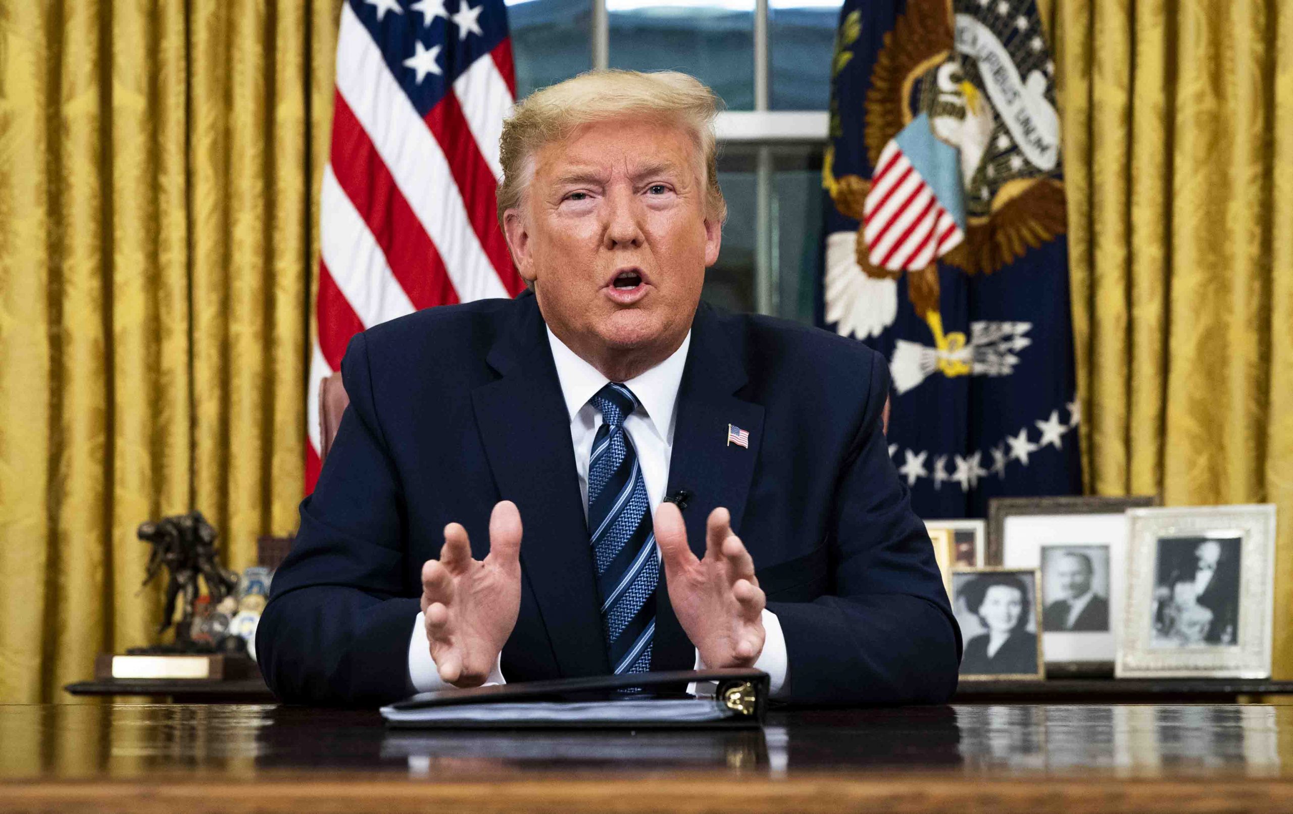 epa08287747 US President Donald J. Trump addresses the nation from the Oval Office about the widening coronavirus crisis, in Washington, DC, USA, 11 March 2020. President Trump announced the suspension of travel from the USA to Europe for the next 30 days. The travel ban excludes the United Kingdom. There are 1,135 confirmed cases of coronavirus infection in the USA, and 38 confirmed fatalities.  EPA/DOUG MILLS / POOL