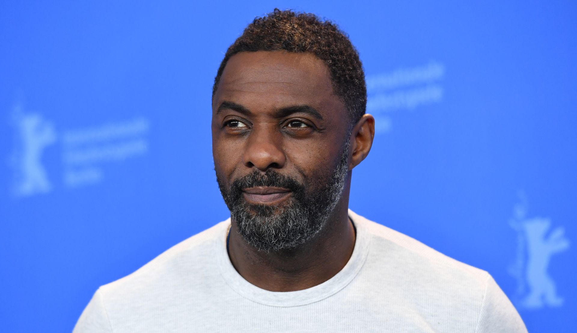 epa08299269 (FILE) - British actor and director Idris Elba poses during a photocall for 'Yardie' at the 68th annual Berlin International Film Festival (Berlinale), in Berlin, Germany, 22 February 2018 (reissued on 16 March 2020). Idris Elba announced on his Twitter account on 16 March 2020 that he has tested positive for Coronavirus Covid-19. He explained that he had 'no symptoms so far' but decided to isolate himself from others.  EPA/SASCHA STEINBACH *** Local Caption *** 54146543