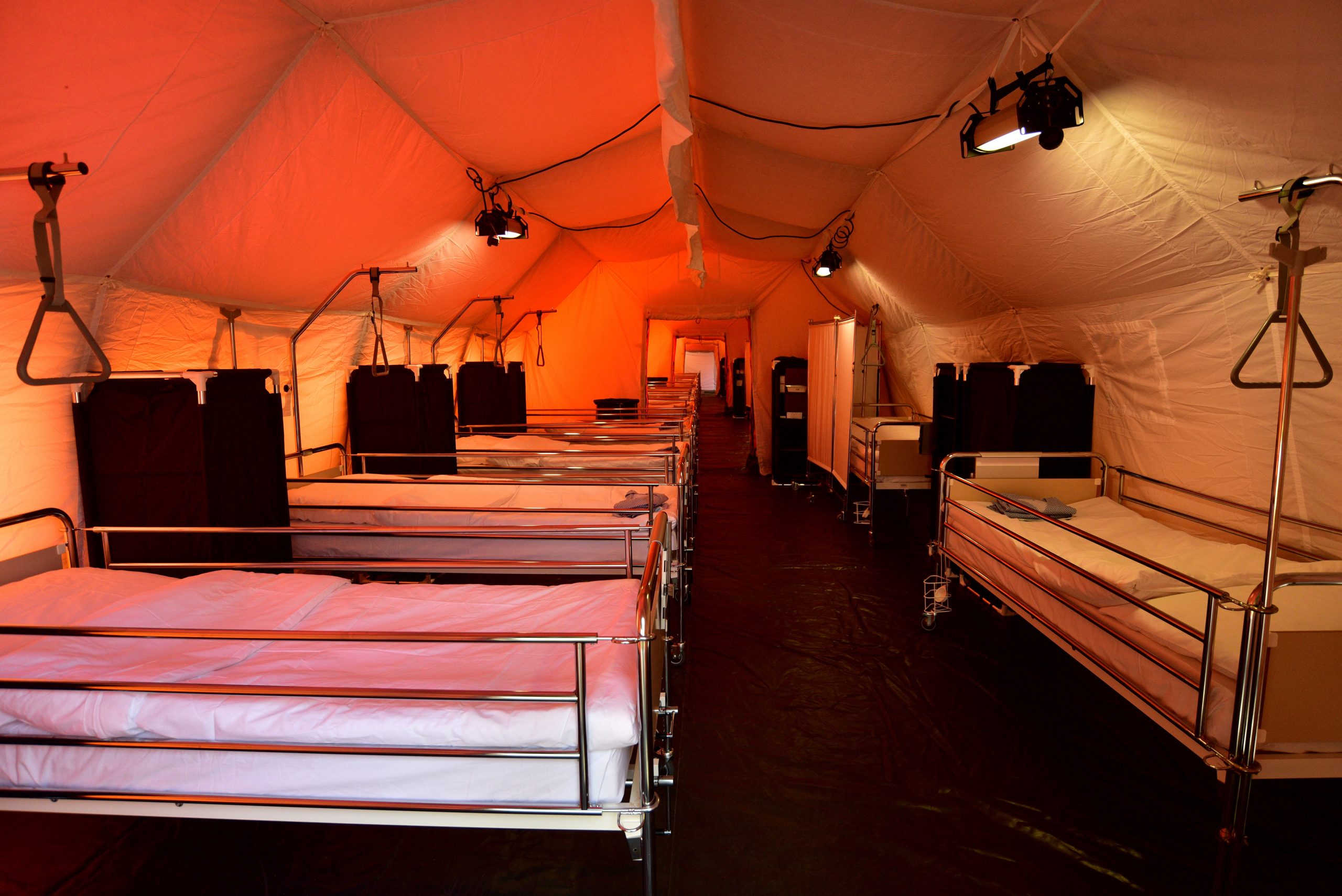epa08301739 View of mobile hospital tents with a total capacity for 120 beds set up by the Slovenian Army at the Edvard Peperko Barracks in Ljubljana, Slovenia, 17 March 2020. The Slovenian government has halted public transport and shut down most shops in a bid to slow down the spread of the COVID-19 disease caused by the SARS-CoV-2 coronavirus. Slovenia, a tiny country of just over 2 million inhabitants that borders the coronavirus hotspot of northern Italy, has recorded at least 253 confirmed cases of the disease, with no deaths reported so far.  EPA/IGOR KUPLJENIK