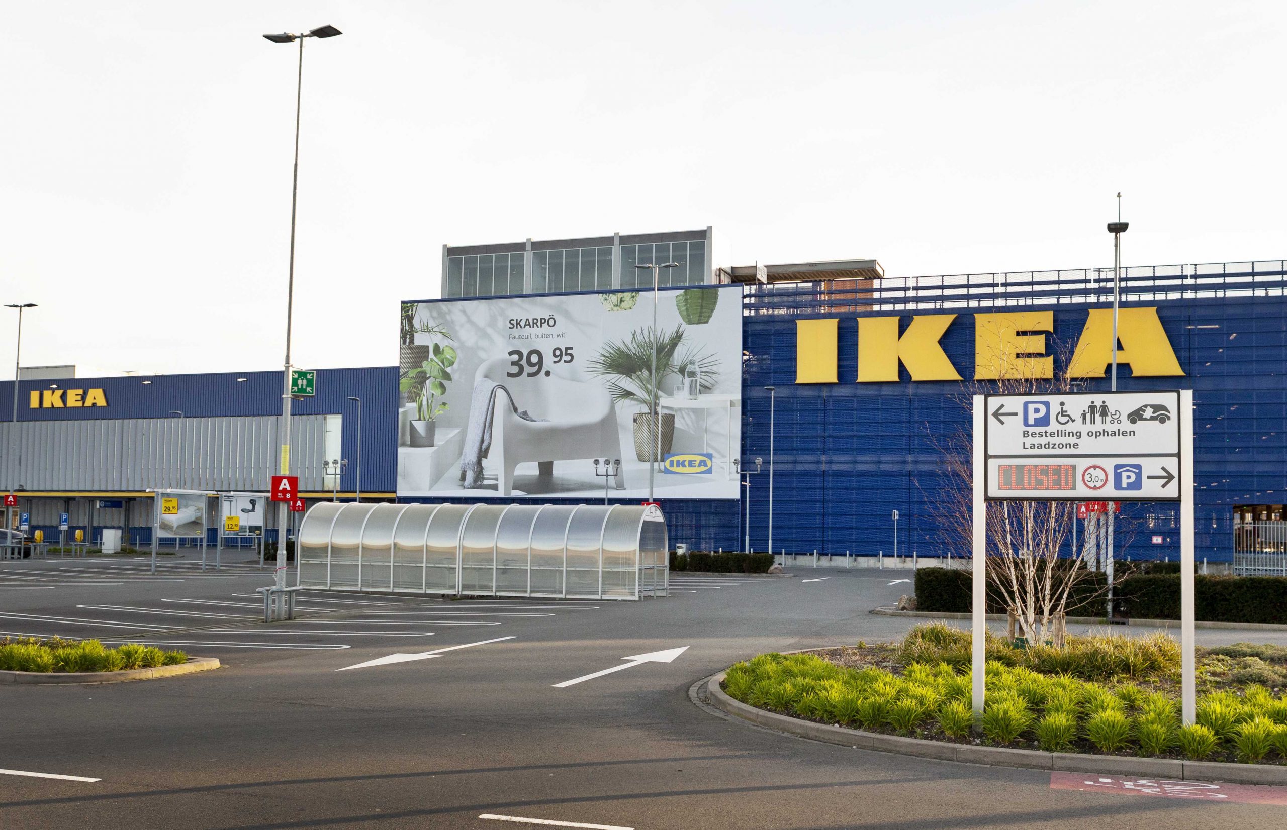 epa08302897 An empty car park at an Ikea store in Delft, The Netherlands, 18 March 2020. The company will keep its thirteen stores in the Netherlands closed until further notice due to the coronavirus outbreak. The Swedish company does this to ensure the health of its staff and customers.  EPA/STEPHAN VAN DEN BOS