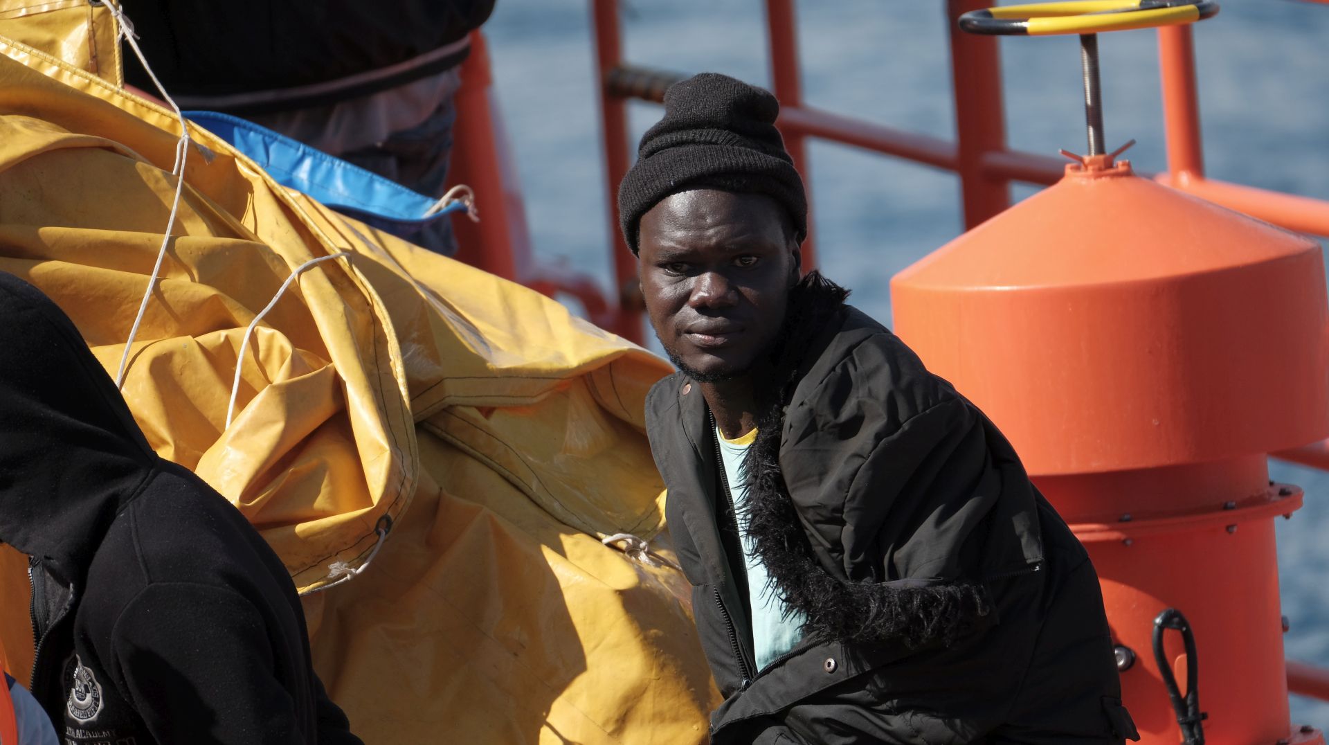 epa08312043 A Spanish Sea Rescue ship carries some of the 21 migrants rescued at sea in Aguineguin, Gran Canaria, Canary Islands, Spain, 21 March 2020. A total of 21 men were rescued while traveling on a small boat 45 miles off the coast of Gran Canaria Island.  EPA/Angel Medina G.