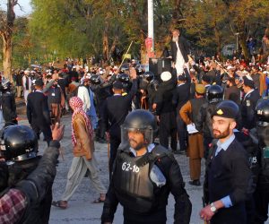 Women's March in Islamabad Police officers gather to stop the men from various religious groups who protest near the site of an Aurat March, Urdu for Women's March, in Islamabad, Pakistan March 8, 2020. REUTERS/Waseem Khan NO RESALES. NO ARCHIVES STRINGER