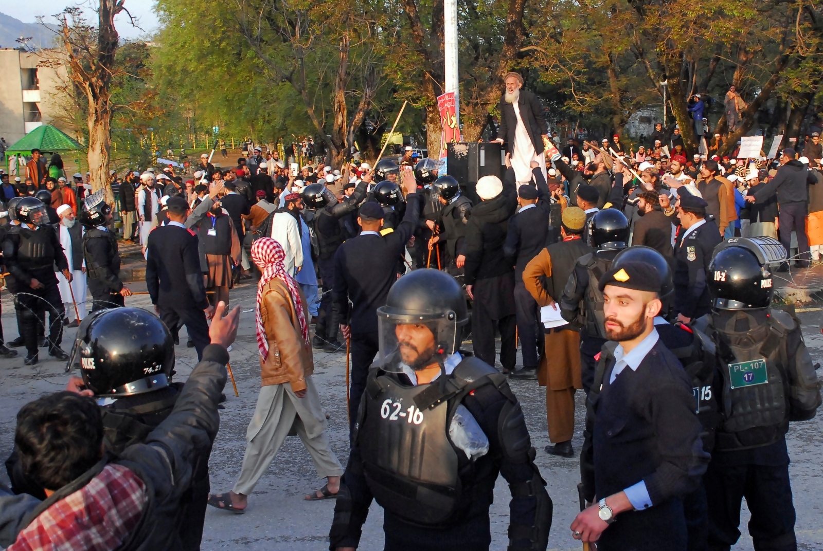 Women's March in Islamabad Police officers gather to stop the men from various religious groups who protest near the site of an Aurat March, Urdu for Women's March, in Islamabad, Pakistan March 8, 2020. REUTERS/Waseem Khan NO RESALES. NO ARCHIVES STRINGER