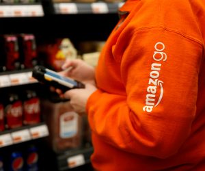 FILE PHOTO: Amazon associate Umipig checks inventory at a smaller format Amazon Go store in the Blue Shift office in Seattle FILE PHOTO: Amazon associate Cindy Umipig checks inventory at a smaller format Amazon Go store in the Blue Shift Amazon office space at 300 Pine Street in downtown Seattle, Washington, U.S., December 10, 2018. Picture taken December 10, 2018.  REUTERS/Lindsey Wasson/File Photo Lindsey Wasson