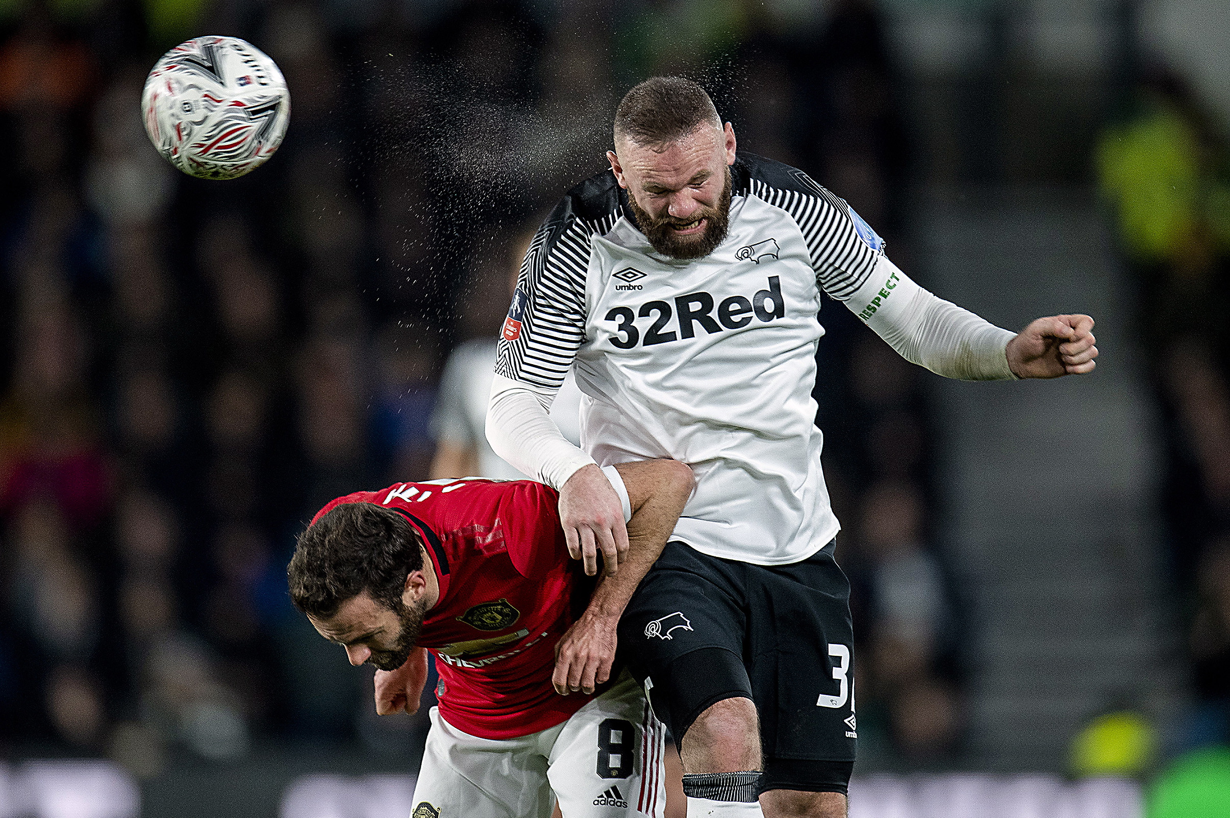 epa08273189 Manchester United's Juan Mata (L) in action with Derby County's Wayne Rooney (R) during the English FA cup fifth round soccer match between Derby County and Manchester United held at the Pride Park in Derby, Britain, 05 March 2020.  EPA/PETER POWELL EDITORIAL USE ONLY. No use with unauthorized audio, video, data, fixture lists, club/league logos or 'live' services. Online in-match use limited to 120 images, no video emulation. No use in betting, games or single club/league/player publications