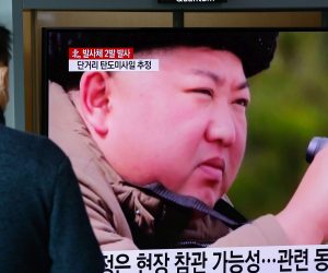 epa08310940 A South Korean person watches breaking news of North Korea's projectile launch, at Seoul Station in Seoul, South Korea, 21 March 2020. According to South Korea's military, North Korea on 21 March fired two short-range ballistic missiles toward the East Sea.  EPA/KIM HEE-CHUL