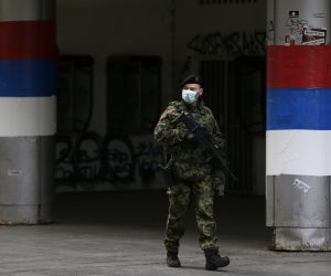 epa08316446 Serbian army soldiers patrol during the curfew starting 5PM till 5AM in Belgrade, Serbia, 23 March 2020. The Serbian authorities declared the state of emergency on Sunday 15 March over the situation with the coronavirus. Several European countries have closed borders, schools and public facilities, and have cancelled major sports and entertainment events in order to prevent the spread of the coronavirus SARS-CoV-2 which causes the Covid-19 disease.  EPA/MARKO DJOKOVIC
