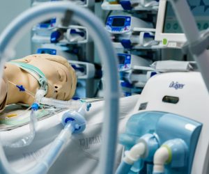 epa08324942 A medical ventilator by the company Draeger can be seen next to a dummy at the Vivantes Humboldt Hospital in Berlin, Germany, 26 March 2020. Berlin health senator Dilek Kalayci and Vivantes Managing Director Andrea Grebe presented a situation with a dummy and a breathing machine. Due to the ongoing pandemic of the COVID-19 disease caused by the SARS-CoV-2 coronavirus, the availability of ventilators is limited.  EPA/CLEMENS BILAN