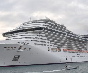 epa08327347 The MSC Splendida cruise ship approaches the port of Genoa, Italy, 27 March 2020. The huge vessel was carrying some 1,116 crew members on board, four of whom are in isolation after being in direct contact with a passenger infected with the the SARS-CoV-2 coronavirus that causes the COVID-19 disease, according to a statement by the press office of the president of the northwestern region of Liguria. Italy has been under a national lockdown since 09 March, as the Mediterranean country has been ravaged by the novel coronavirus with a devastating toll of more than 9,000 deaths so far.  EPA/LUCA ZENNARO