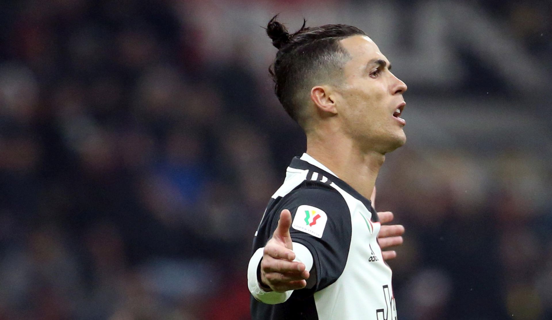 epa08329337 (FILE) -  Juventus' Cristiano Ronaldo celebrates scoring the equalizer from the penalty spot during the first leg of the Coppa Italia semi final soccer match between AC Milan and Juventus at Giuseppe Meazza stadium in Milan, Italy, 13 February 2020 (reissued on 28 March 2020). On 28 March 2020 Juventus FC announced, amid the COVID-19  coronavirus crisis, to have 'reached an understanding with players and coach of the First Team for the reduction of their compensation for an amount equal to the monthly payments of March, April, May and June 2020'.  EPA/MATTEO BAZZI