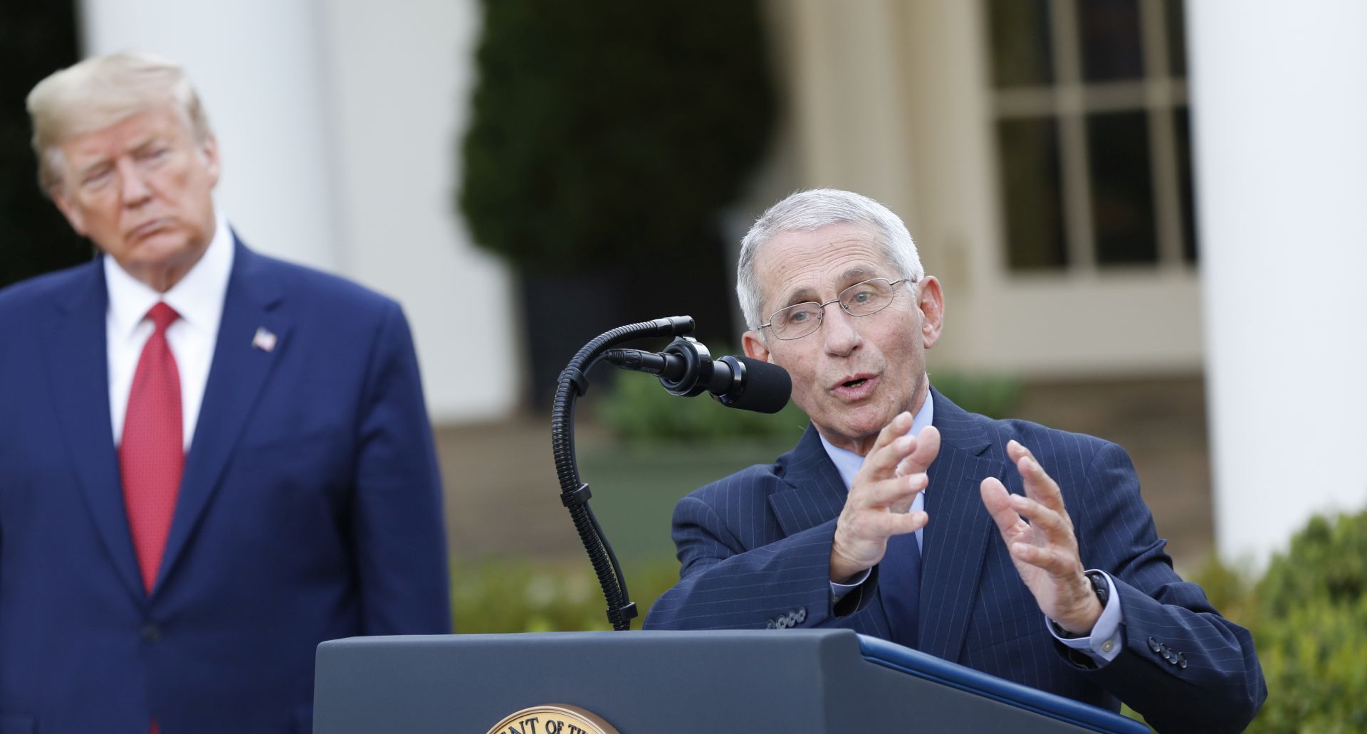 epa08330939 Director of the National Institute of Allergy and Infectious Diseases at the National Institutes of Health Dr. Anthony Fauci, right, makes remarks during United States President Donald J. Trump's, left, daily Coronavirus press conference in the Rose Garden of the White House in Washington, DC, USA, on 29 March 2020. Countries around the world are taking increased measures to stem the widespread of the SARS-CoV-2 coronavirus which causes the Covid-19 disease.  EPA/Stefani Reynolds / POOL