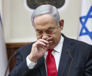 epa08331827 (FILE) - Israeli Prime Minister Benjamin Netanyahu chairs the weekly cabinet meeting in Jerusalem, 08 March 2020. According to news reports on 30 March 2020, Netanyahu will self-isolate after a parliamentary tests positive for coronavirus. Netanyahu was scheduled to undergo a coronavirus test by 31 March, a previous test on March 15, found the premier to be negative.  EPA/ODED BALILTY pool photo
