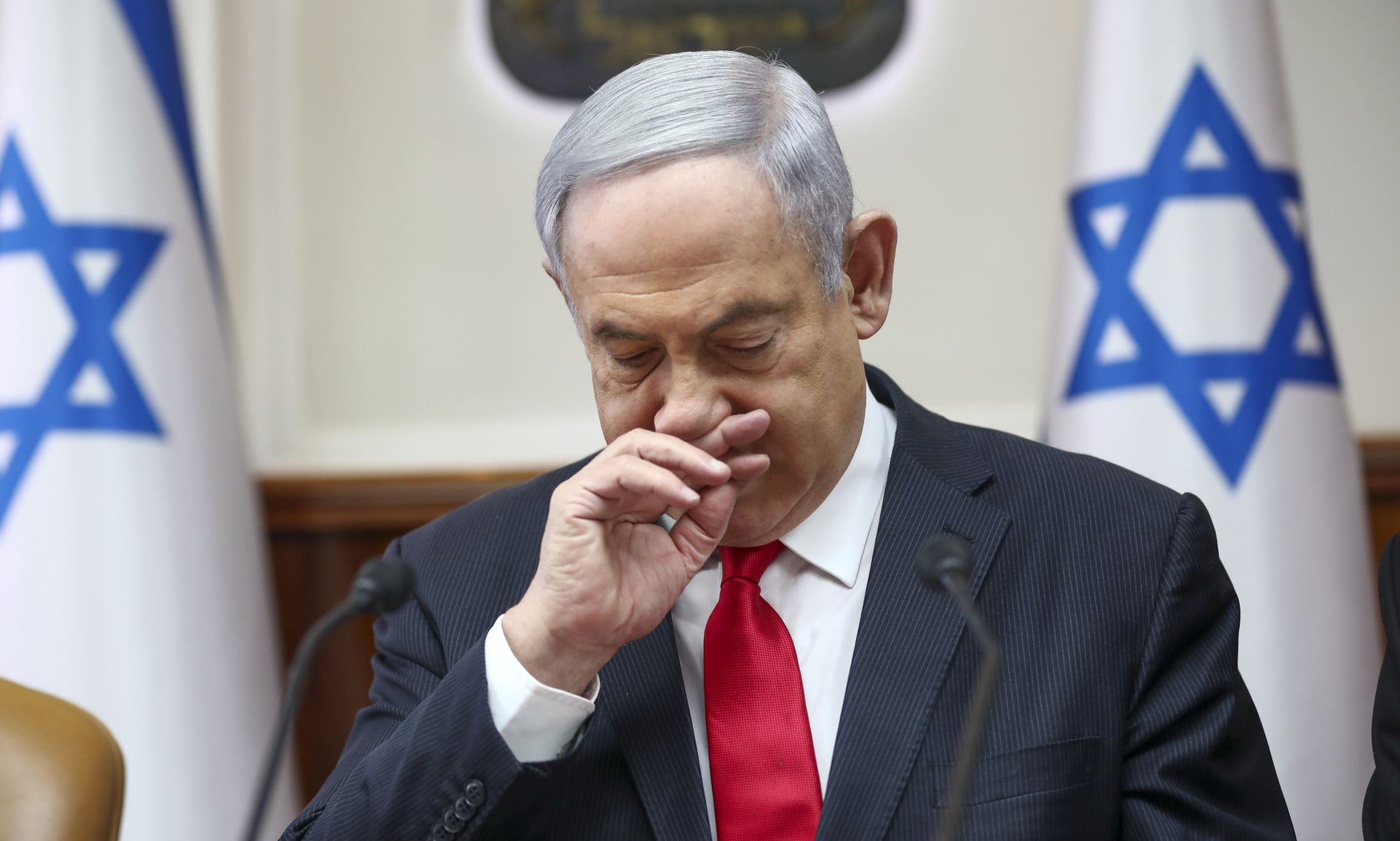 epa08331827 (FILE) - Israeli Prime Minister Benjamin Netanyahu chairs the weekly cabinet meeting in Jerusalem, 08 March 2020. According to news reports on 30 March 2020, Netanyahu will self-isolate after a parliamentary tests positive for coronavirus. Netanyahu was scheduled to undergo a coronavirus test by 31 March, a previous test on March 15, found the premier to be negative.  EPA/ODED BALILTY pool photo
