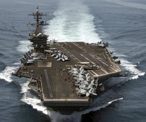 epa08335877 (FILE) - An aerial handout image made available by US Navy showing the aircraft carrier USS Theodore Roosevelt (CVN 71) operating in the Arabian Sea on 21 April 2015 (reissued 01 April 2020). According to reports,  Captain Brett Crozier, captain of the US aircraft carrier Theodore Roosevelt, which is currently docked in Gua, has penned a letter calling for decisive action to be taken to avert deaths on the carrier.  EPA/MC3 ANTHONY N. HILKOWSKI / HANDOUT  HANDOUT EDITORIAL USE ONLY/NO SALES