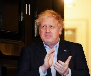 epa08339744 A handout photo made available by No. 10 Downing Street of Britain's Prime Minister Boris Johnson applauding during a 'Claps for our Carers' outside 11 Downing Street in London, Britain, 02 April March 2020. Boris Johnson, who is self-isolating in Downing Street after contracting the pandemic COVID-19 disease caused by the SARS-CoV-2 coronavirus himself, is facing criticism over his government's testing strategy.  EPA/PIPPA FOWLES / DOWNING STREET HANDOUT  HANDOUT EDITORIAL USE ONLY/NO SALES