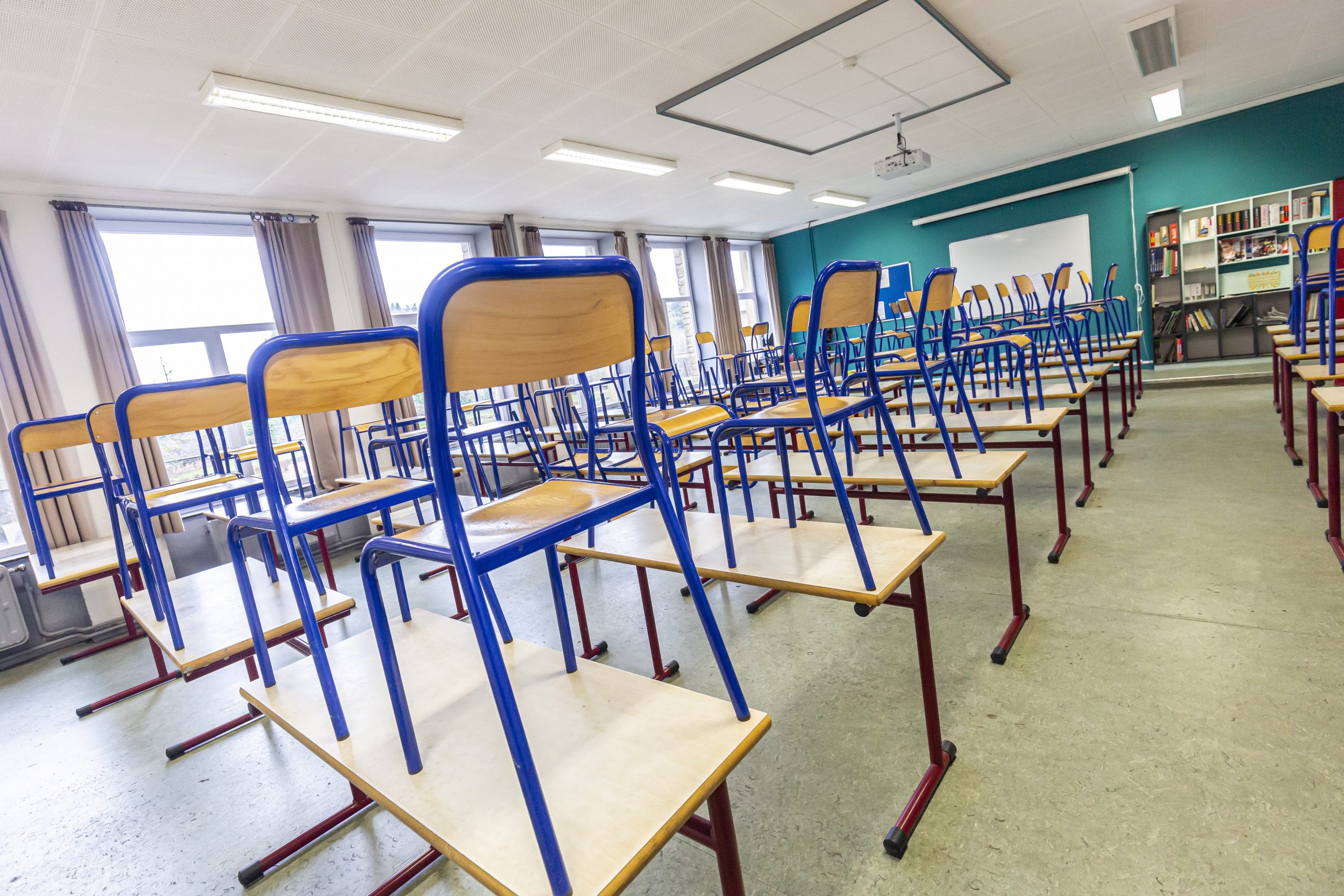 epa08340332 An empty classroom at the secondary school in Izel, Belgium, 03 April 2020. As the two weeks of Easter holidays (or officially spring holidays) approach, school have no plans to reopen after the holidays. Countries around the world are taking increased measures to stem the widespread of the SARS-CoV-2 coronavirus which causes the Covid-19 disease.  EPA/JULIEN WARNAND