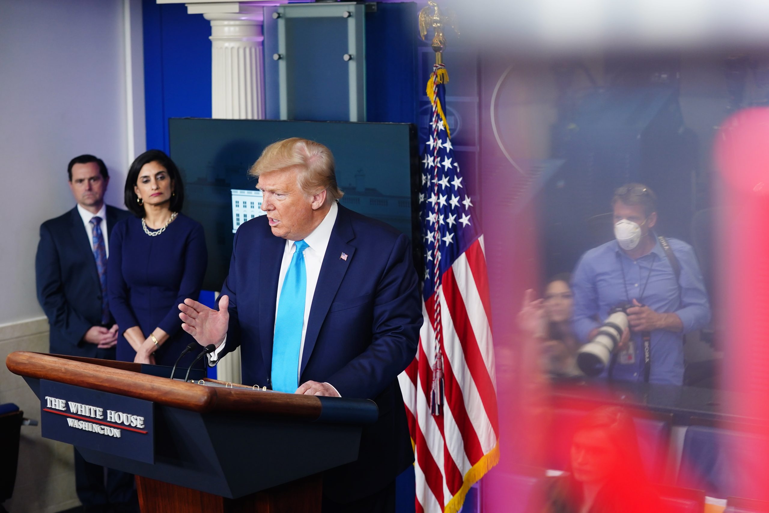 epa08349408 US President Donald J. Trump, joined by members of the Coronavirus Task Force, delivers remarks on the COVID-19 pandemic in the James S. Brady Press Briefing Room of the White House in Washington, DC, USA, 07 April 2020.  EPA/JIM LO SCALZO